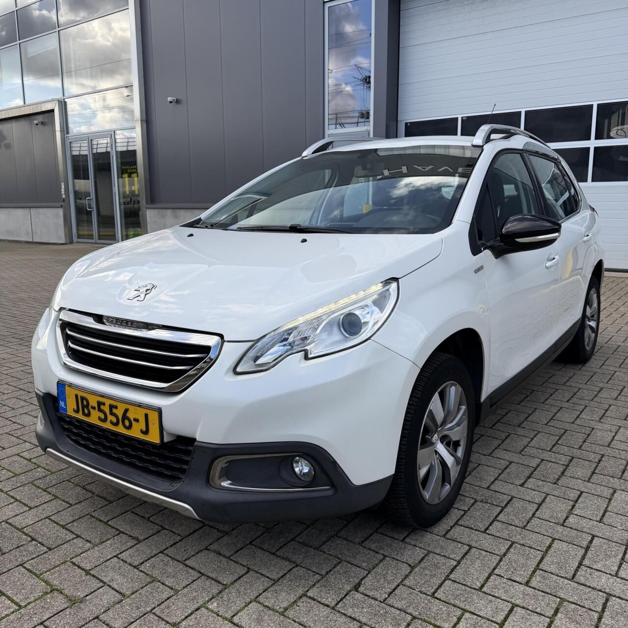 Peugeot 2008 - 1.2 2016 Allure | Navi | PDC | Airco ! - AutoWereld.nl
