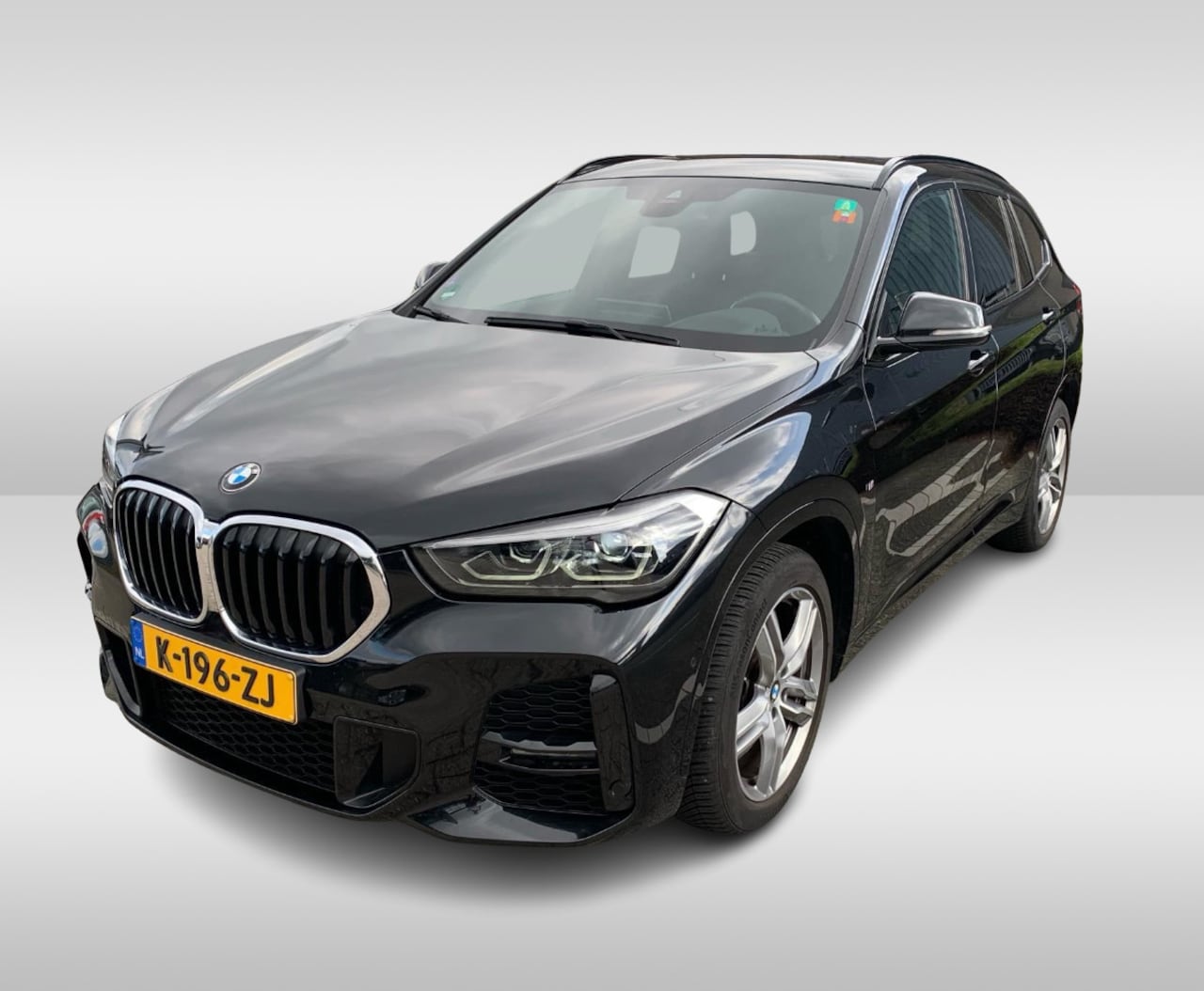 BMW X1 - sDrive18i High Exe. M Sport / Trekhaak / Half leder / Navi. Proff / Parkeerhulp V+a / 18'' - AutoWereld.nl