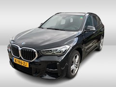 BMW X1 - sDrive18i High Exe. M Sport / Trekhaak / Half leder / Navi. Proff / Parkeerhulp V+a / 18''