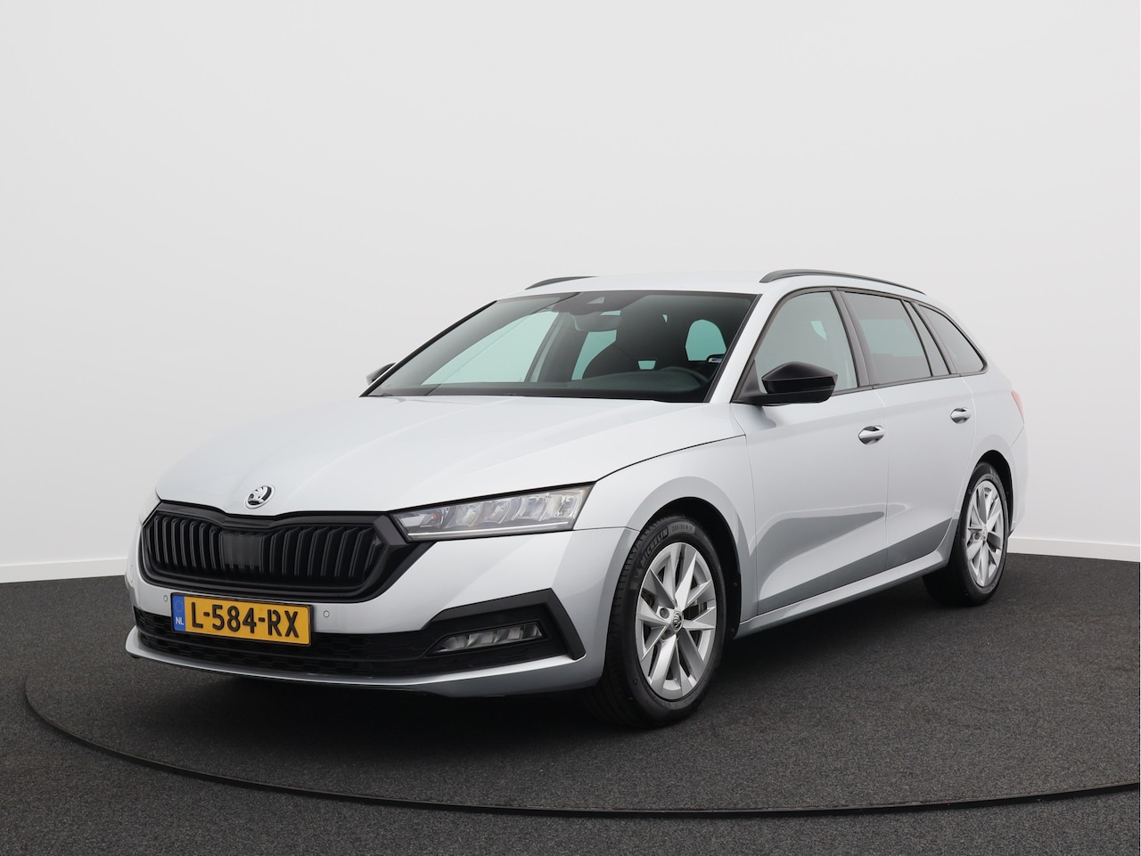 Skoda Octavia Combi - 1.5 e-TSI Sport Business/ automaat! - AutoWereld.nl