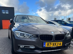 BMW 3-serie - 320i High Executive