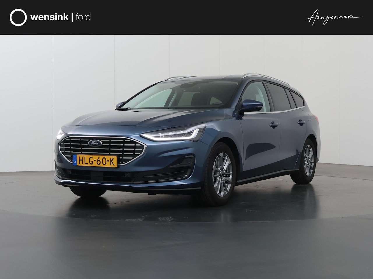 Ford Focus Wagon - 1.0 EcoBoost Hybrid Titanium | Trekhaak | Winterpakket | Cruise Control | Climate Control - AutoWereld.nl