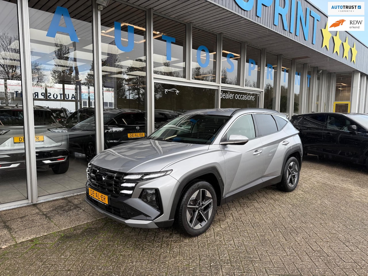 Hyundai Tucson - 1.6 T-GDI HEV Comfort 161PK / NAVIGATIE / ELEKTRISCHE ACHTERKLEP / - AutoWereld.nl