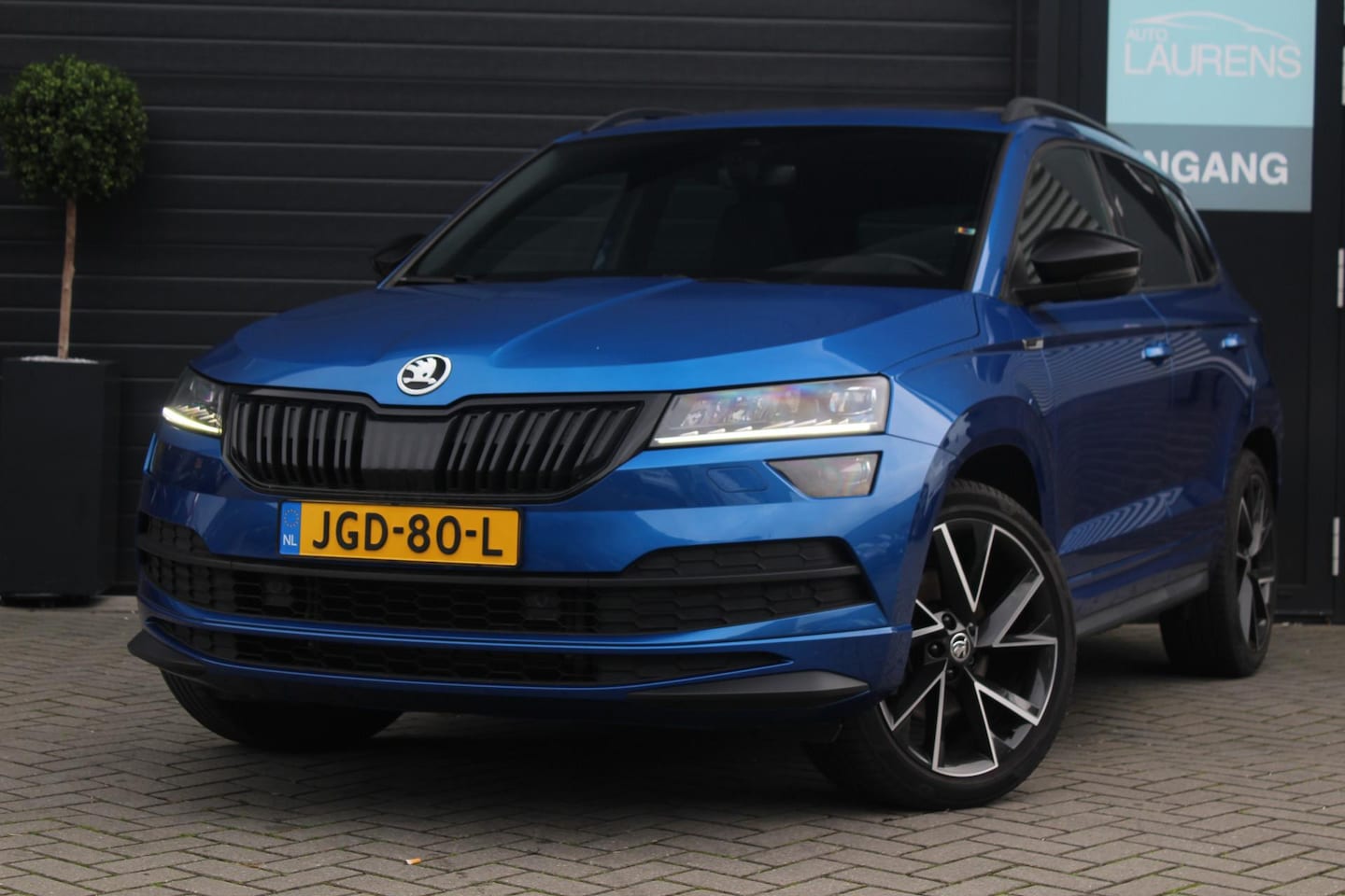 Skoda Karoq - 2.0 TSI 4x4 Sportline Business | Pano | ACC | Canton - AutoWereld.nl