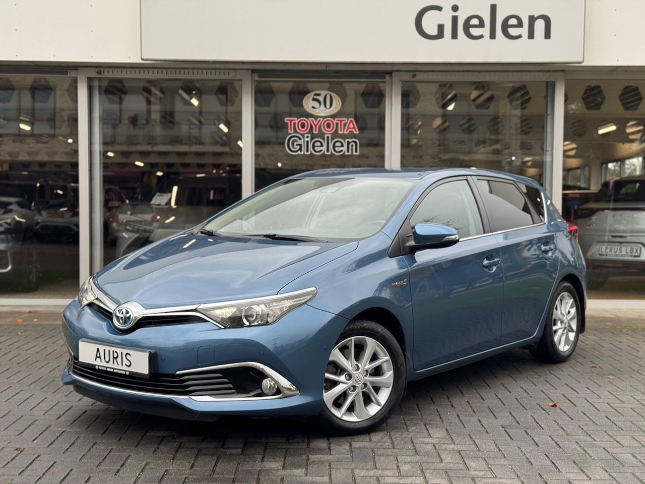 Toyota Auris - 1.8 Hybrid Executive | Eerste eigenaar, Trekhaak, Half leer, Navigatie, Stoelverwarming, P - AutoWereld.nl
