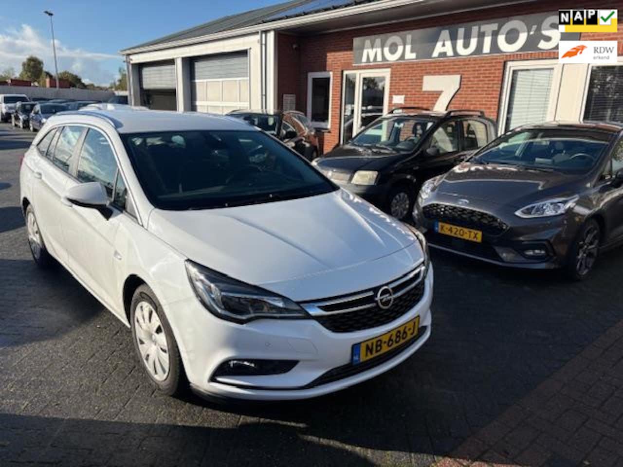 Opel Astra Sports Tourer - 1.6 CDTI Business 1.6 CDTI Business+ , Navi , Trekhaak , 206000km NAP - AutoWereld.nl