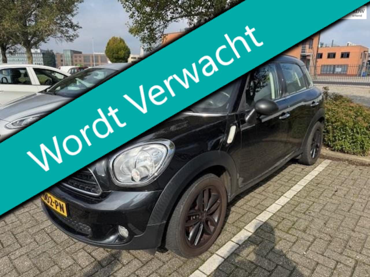 MINI Countryman - Mini 1.6i 98pk 2e eigenaar 137.000km Airco Cruise PDC - AutoWereld.nl