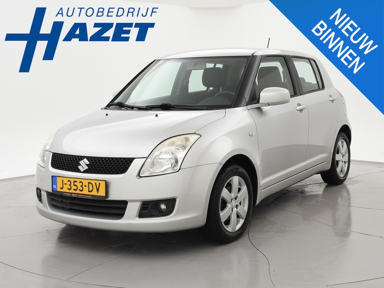 Suzuki Swift - 1.3 4GRIP 4X4 5-DEURS EXCLUSIVE + TREKHAAK | STOELVERWARMING | AIRCO - AutoWereld.nl
