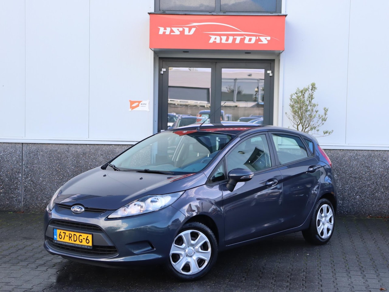Ford Fiesta - 1.25 Limited airco 4-deurs org NL - AutoWereld.nl