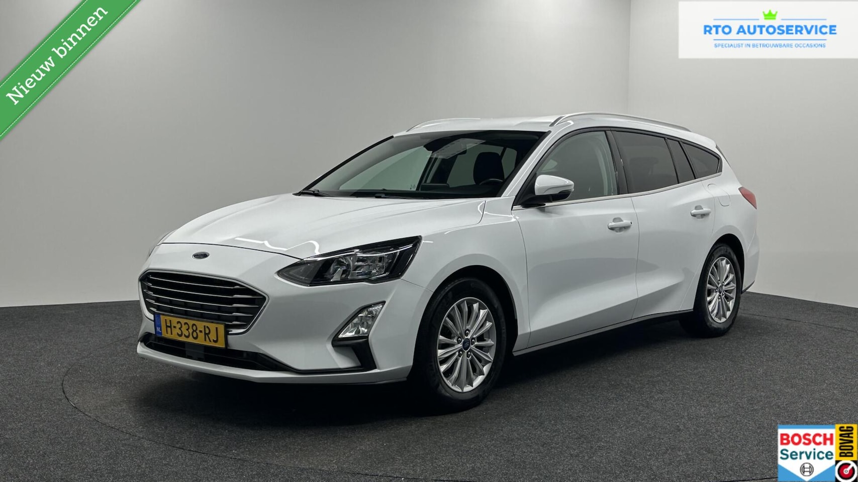 Ford Focus Wagon - 1.0 EcoBoost Titanium Business TREKHAAK CRUISE ECC LM. - AutoWereld.nl