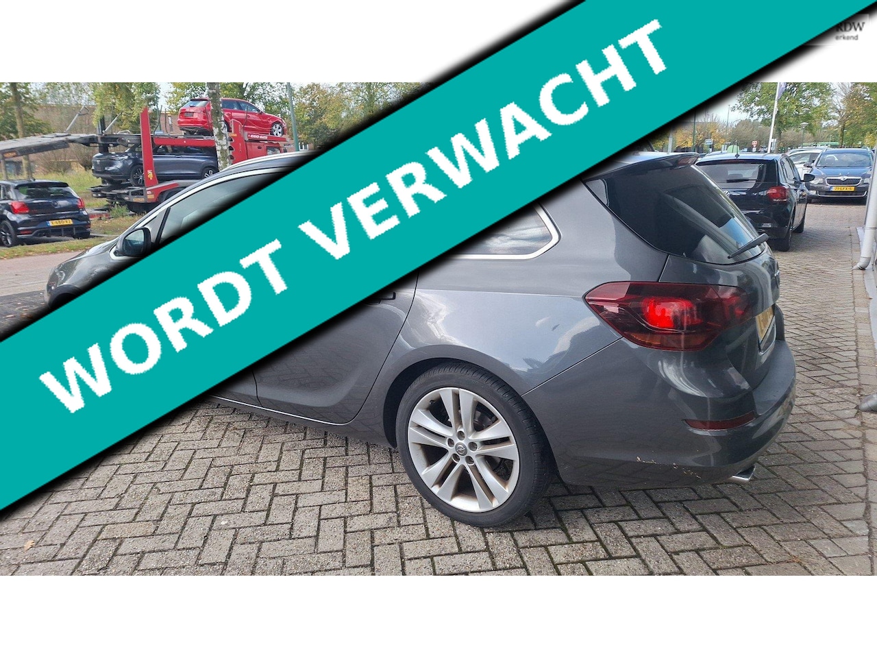 Opel Astra Sports Tourer - 1.4 Turbo Sport 140pk Clima Cruise Navi - AutoWereld.nl