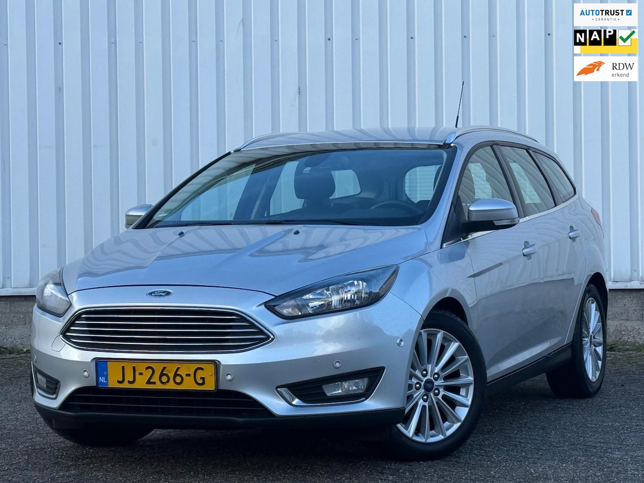 Ford Focus Wagon - 1.0 Titanium (125PK) 2e Eigenaar,Climate,Navi,Cruise,Bleutooth,PDC,DealerOnderhouden,Apk t - AutoWereld.nl