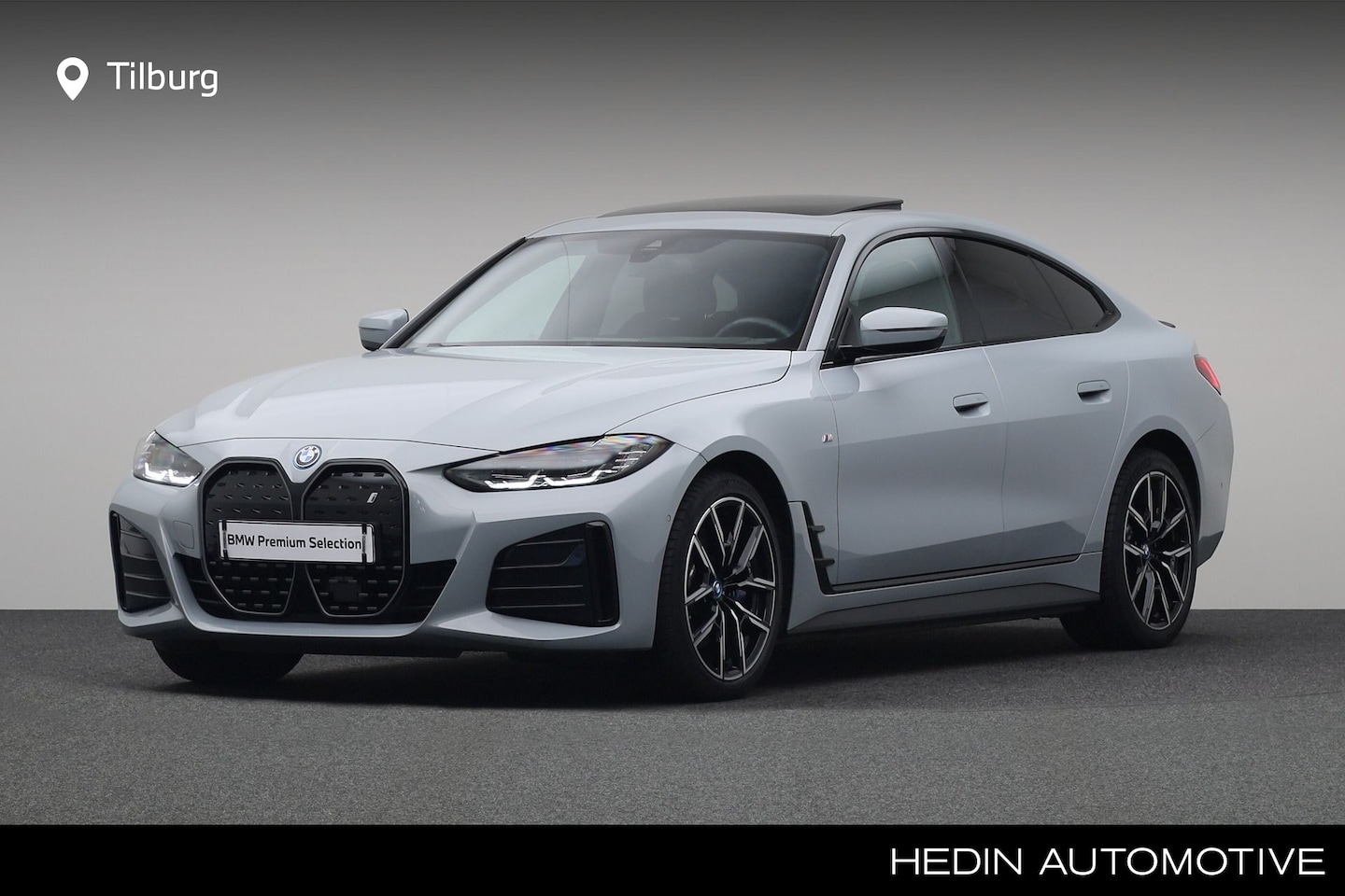 BMW i4 - eDrive40 High Executive 84 kWh | Glazen schuif-/kanteldak | Comfort Access | Voorstoelen/S - AutoWereld.nl