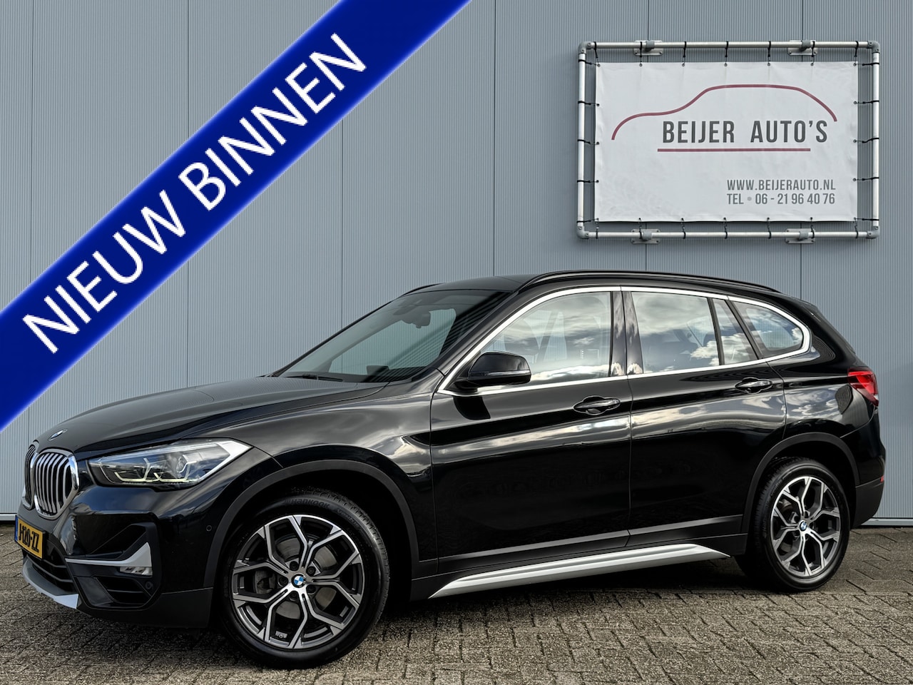 BMW X1 - sDrive18i High Executive Automaat/Trekhaak/Camera/Navi/HUD. - AutoWereld.nl