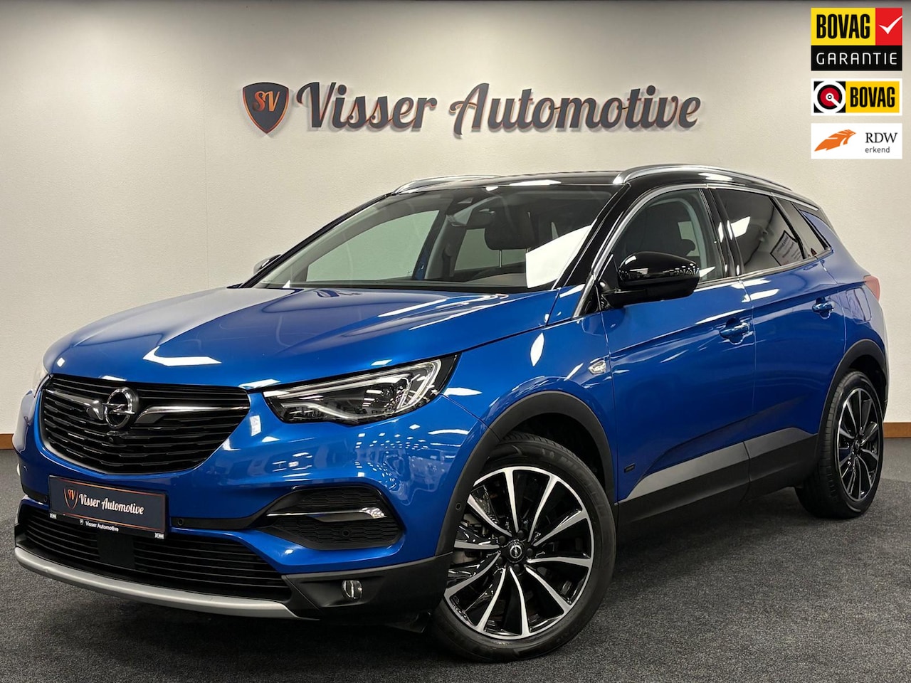 Opel Grandland X - 1.6 Hybrid Plug-in*Ultimate*Stoelverwarming*Leder*Xenon*Airco*PDC*Trekhaak* - AutoWereld.nl