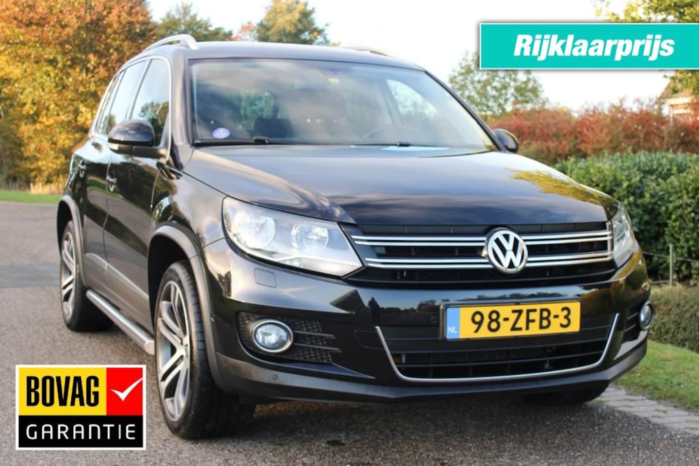 Volkswagen Tiguan - 2.0TSI 235pk SportenStyle 4WD automaat ECC/cruise/navi/trekhaak - AutoWereld.nl