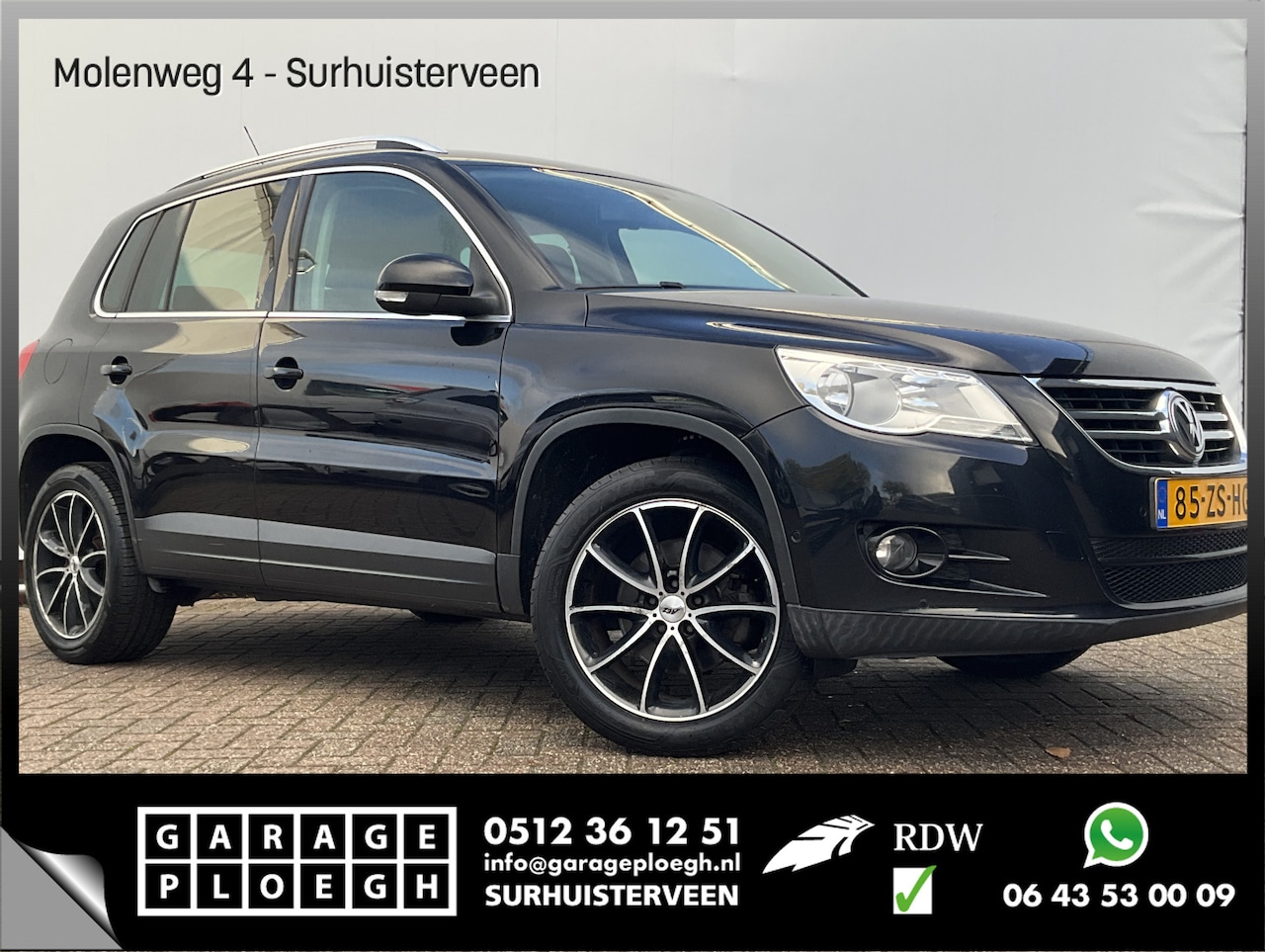 Volkswagen Tiguan - 2.0 TSI 200pk Sport&Style 4Motion Leer+Stoelverw. Trekhaak(2200) 4x4 - AutoWereld.nl