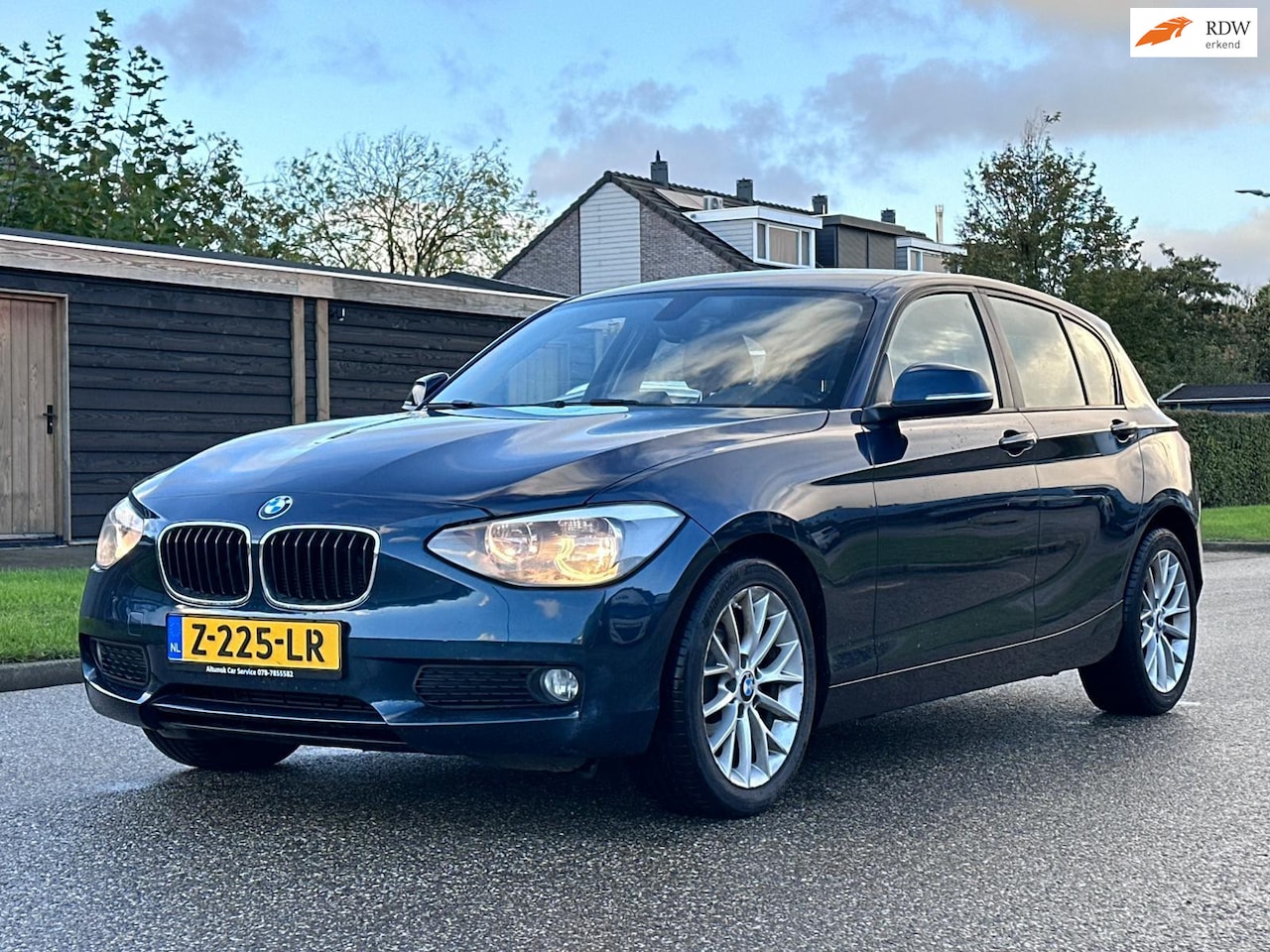 BMW 1-serie - 116i 5DR*Navigatie*Cruise*Airco*LM velgen*Parkeersensoren* - AutoWereld.nl
