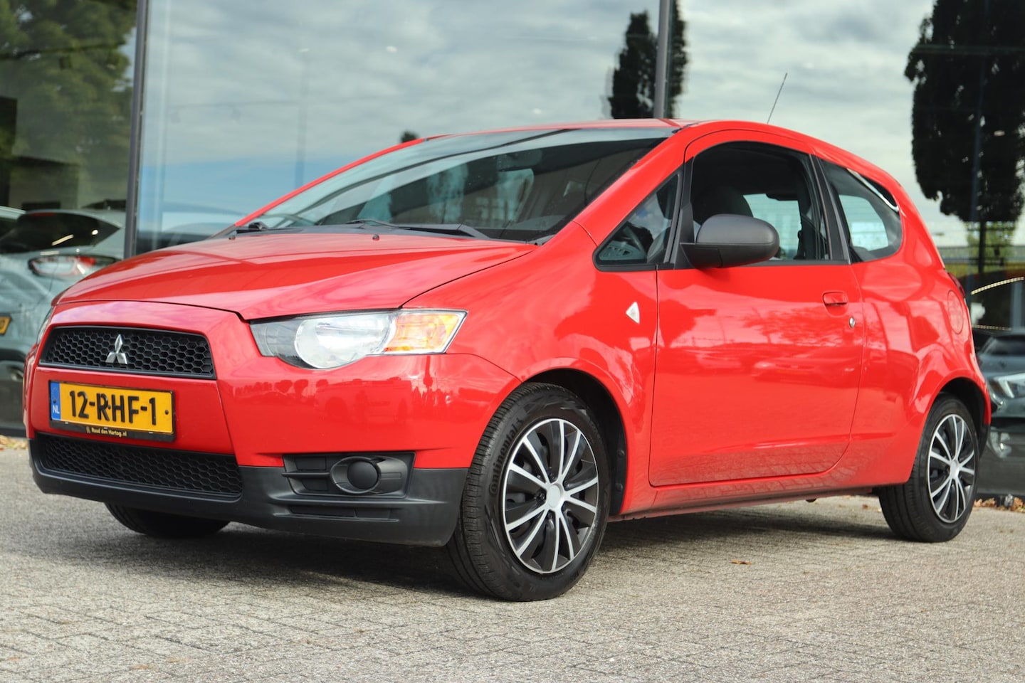 Mitsubishi Colt - 1.1 EDITION ONE *RIJKLAAR* | NAP | ORIG NL | AIRCO | ELEK RAMEN | DAKSPOILER - AutoWereld.nl