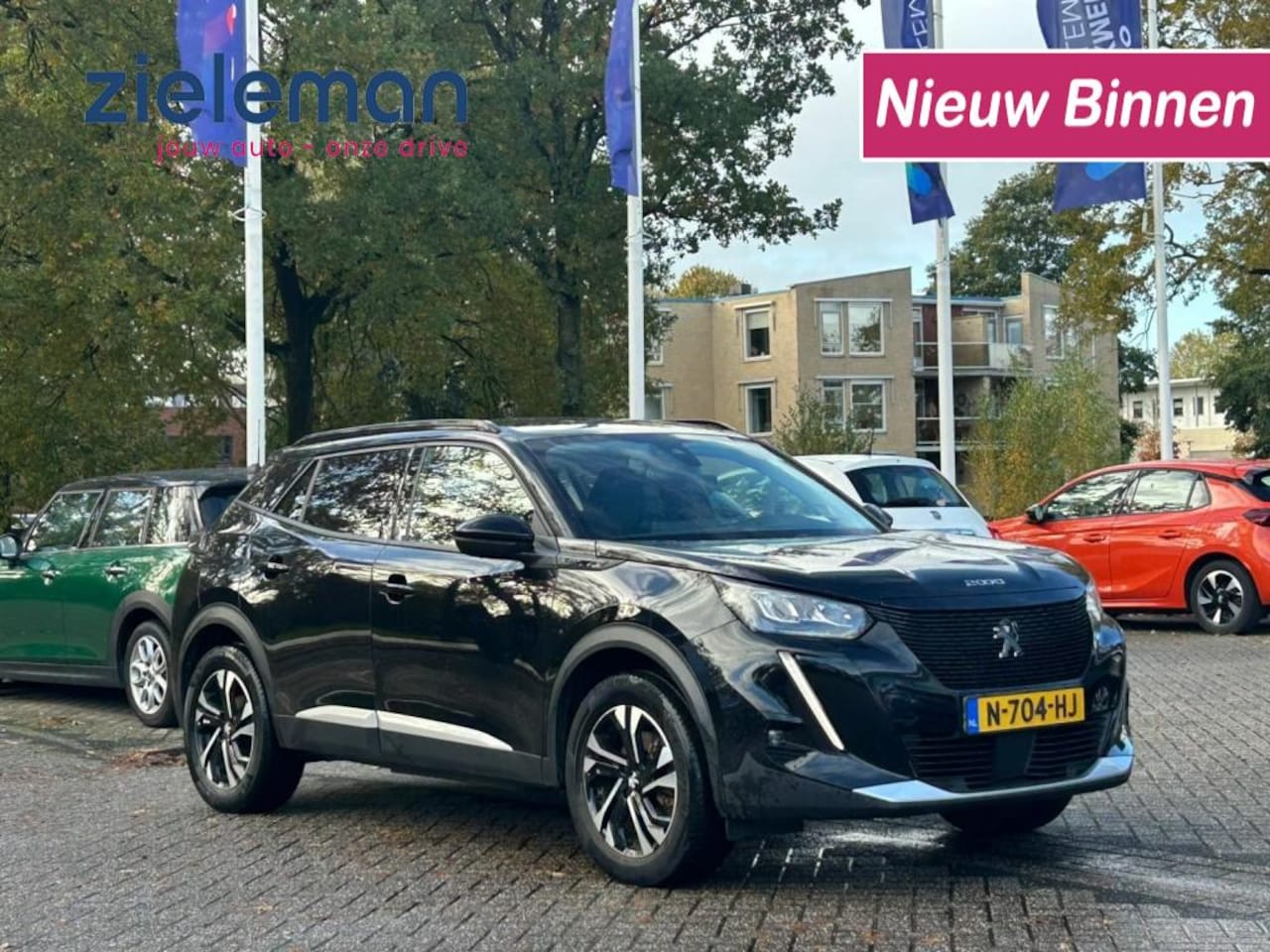 Peugeot e-2008 - Allure Pack 50 kWh - Carplay, Navi, Camera, Digitaal Cockpit, Half Leer - AutoWereld.nl