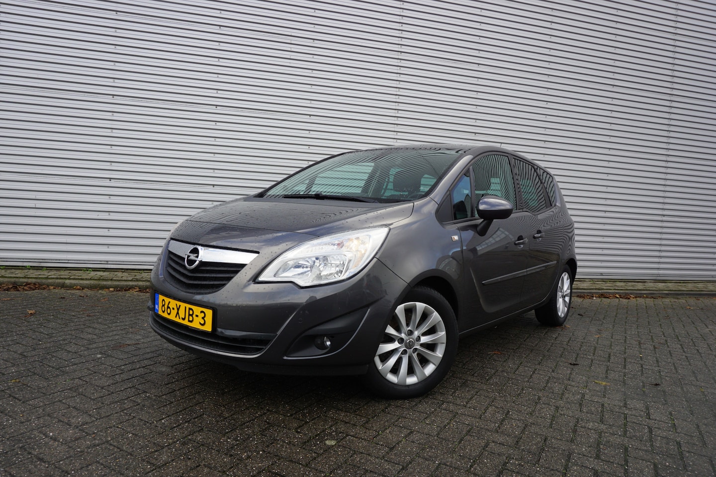 Opel Meriva - 1.4 Turbo Anniversary Edition Airco / Navi / Cruise / Elektr. ramen / Parkeers. / Trekhaak - AutoWereld.nl