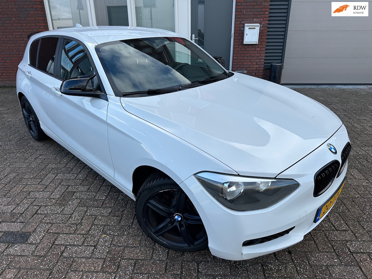 BMW 1-serie - 116i / Clima / 5DRS / NAP / LM - AutoWereld.nl