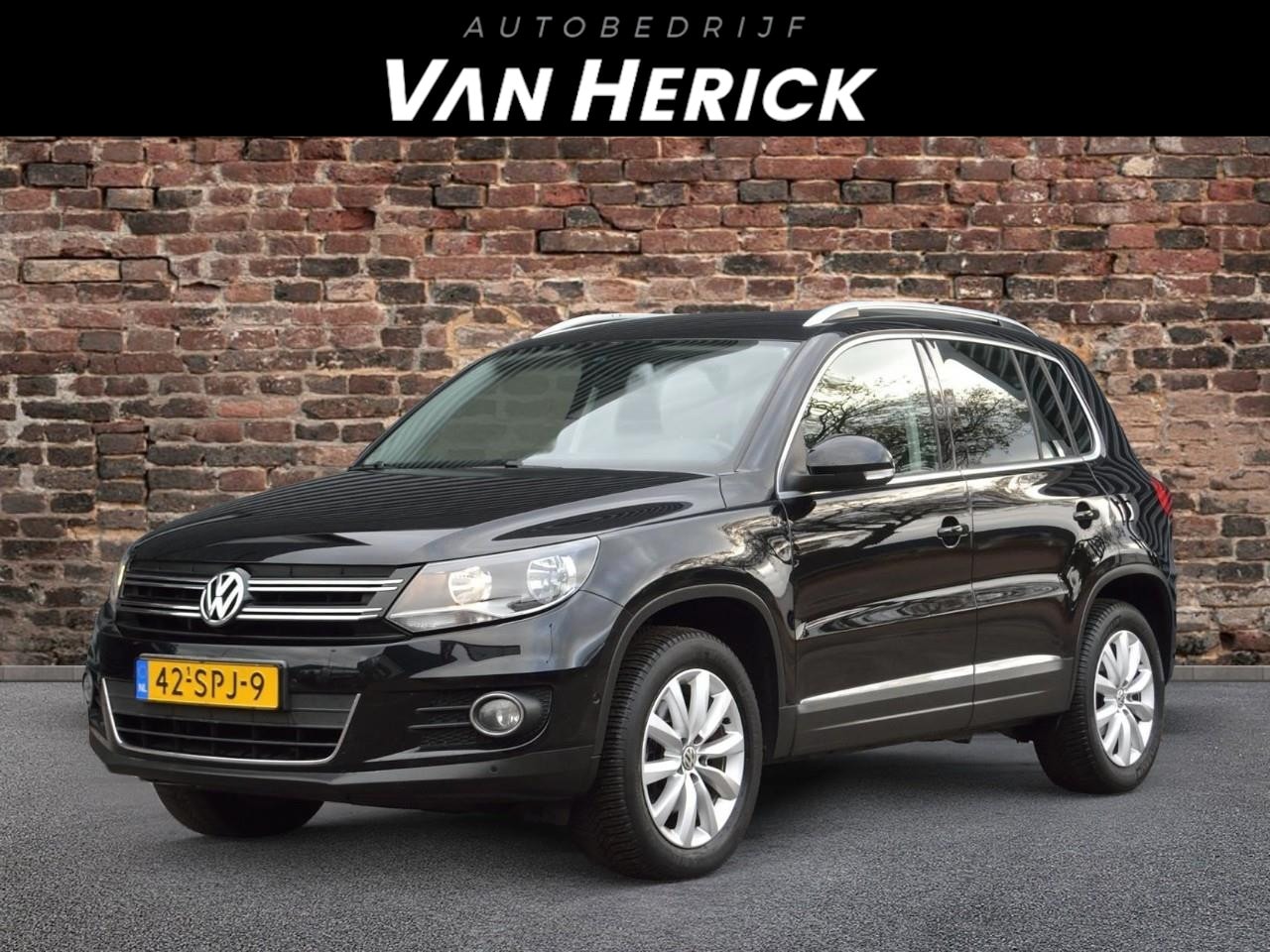 Volkswagen Tiguan - 1.4 TSI Sport&Style | Navi | Cruise | NAP | Nette Staat - AutoWereld.nl
