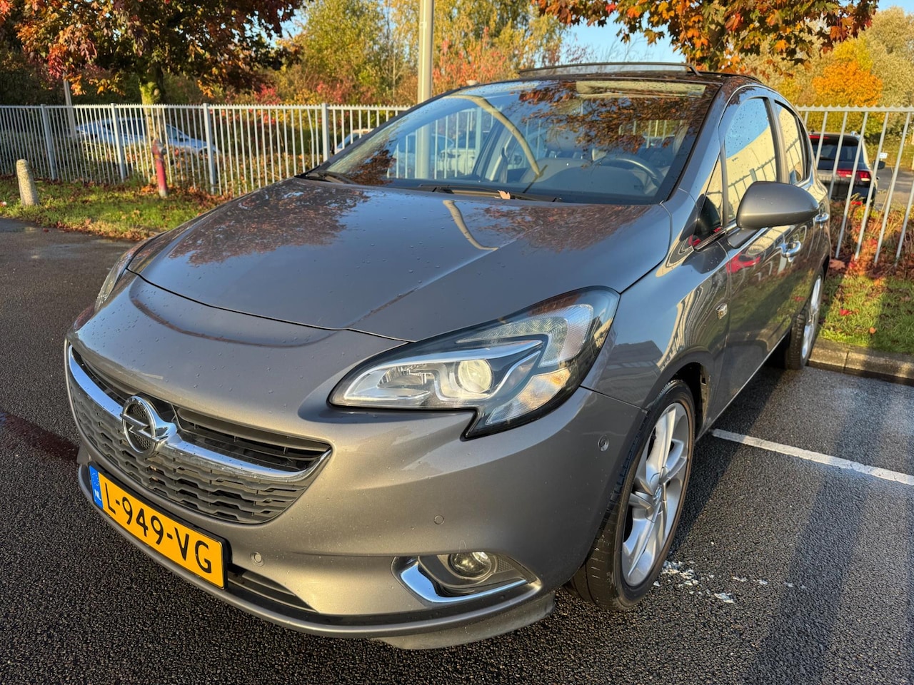 Opel Corsa - 1.0 Turbo Cosmo Xenon Panorama Clima Stoelv. Stuurverw. - AutoWereld.nl
