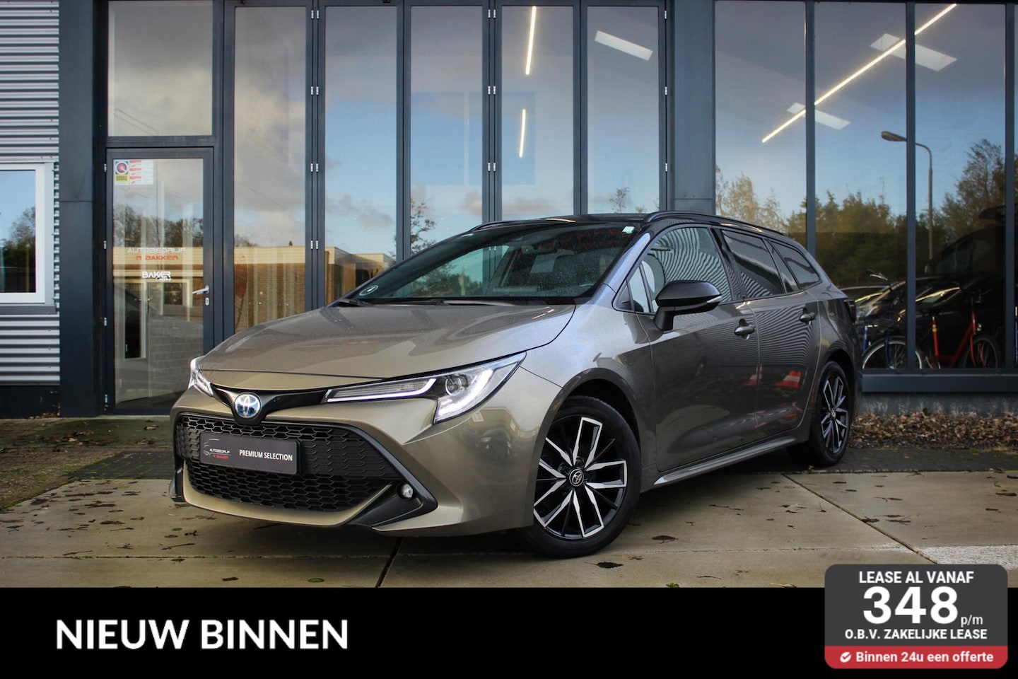 Toyota Corolla Touring Sports - 1.8 Hybrid Active Bi-tone // Stoel- & Stuurverwarming | HUD | Camera | CarPlay & Android A - AutoWereld.nl