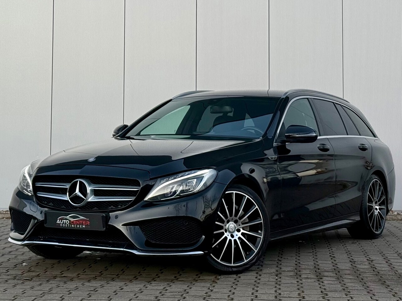 Mercedes-Benz C-klasse Estate - 180 Prestige AMG Leder|SfeerV|Trekhaak - AutoWereld.nl