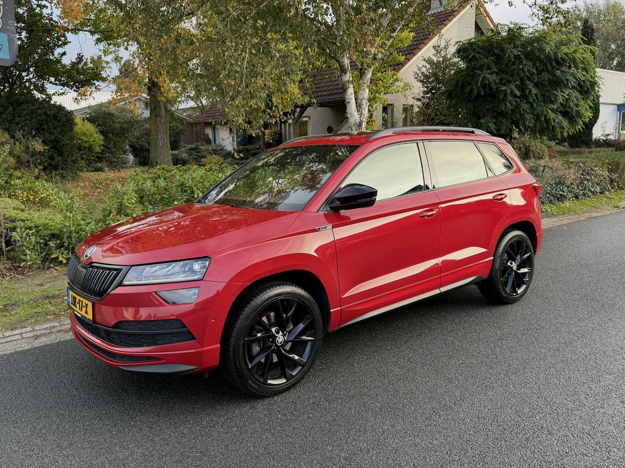 Skoda Karoq - 2.0 TSI 4x4 Sportline 190PK Pano•Trekhaak - AutoWereld.nl