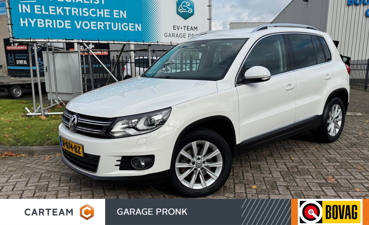 Volkswagen Tiguan - 1.4 TSI Sport&Style NAVI/PDC/XENON/CRUIS - AutoWereld.nl
