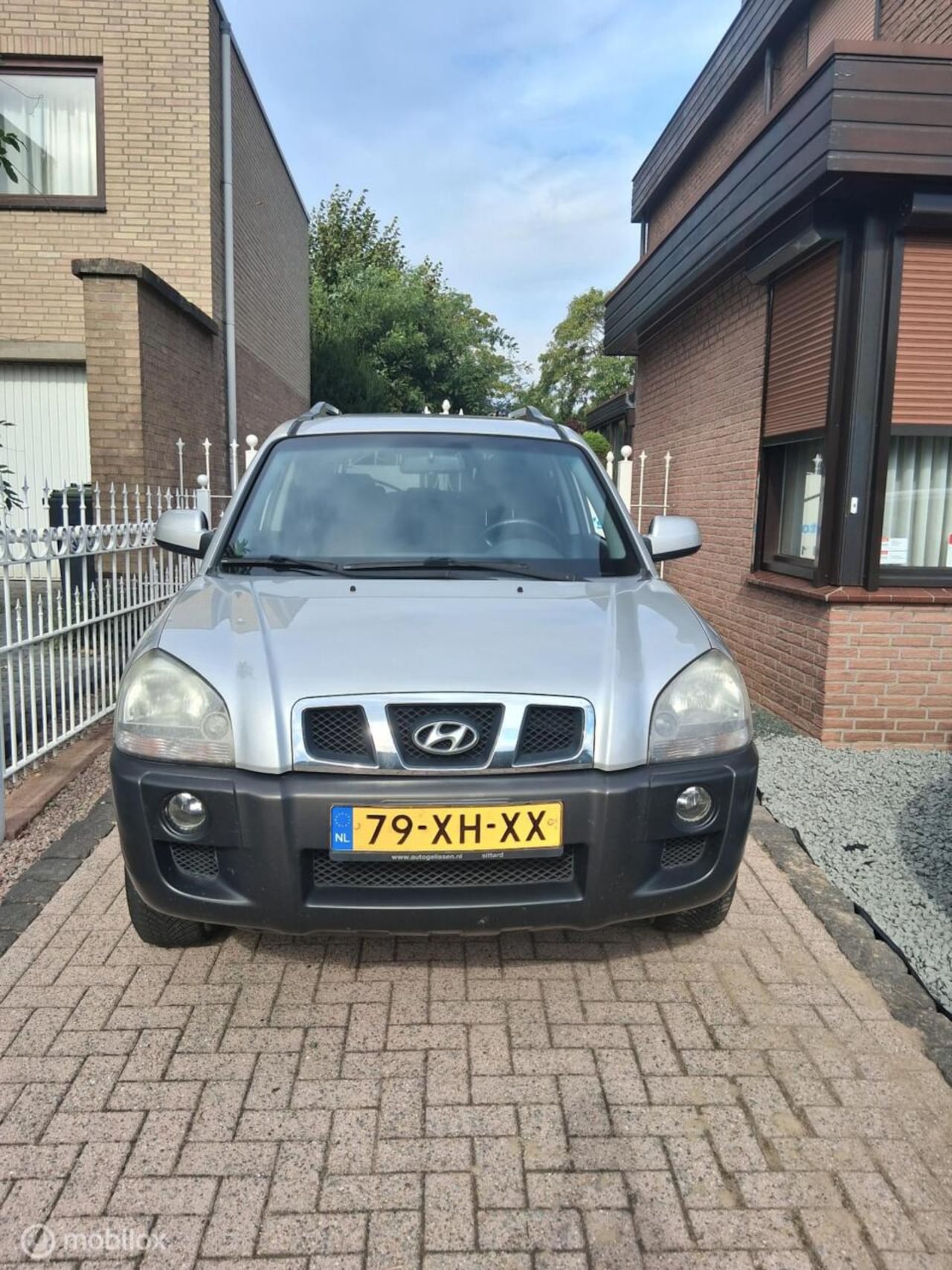 Hyundai Tucson - 2.0i Dynamic 2.0i Dynamic - AutoWereld.nl