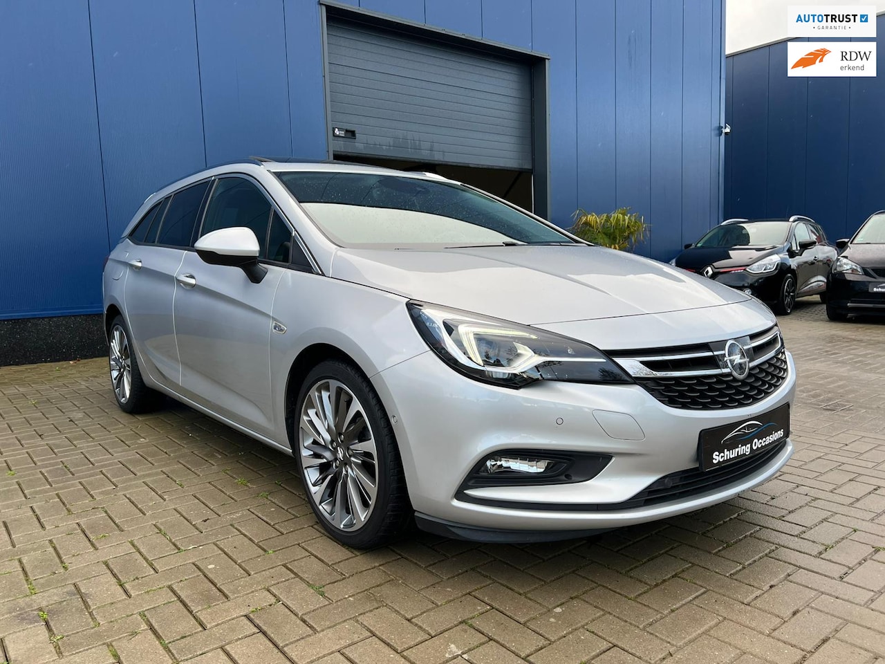 Opel Astra Sports Tourer - 1.4 ULTIMATE / FULL OPTIONS / PANO / AUTOMAAT / LEDER / MEMORY / CAMERA / CRUISE / CARPLAY - AutoWereld.nl