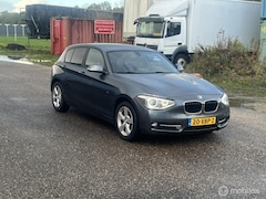 BMW 1-serie - 116i Business+ Automaat *Koppaking