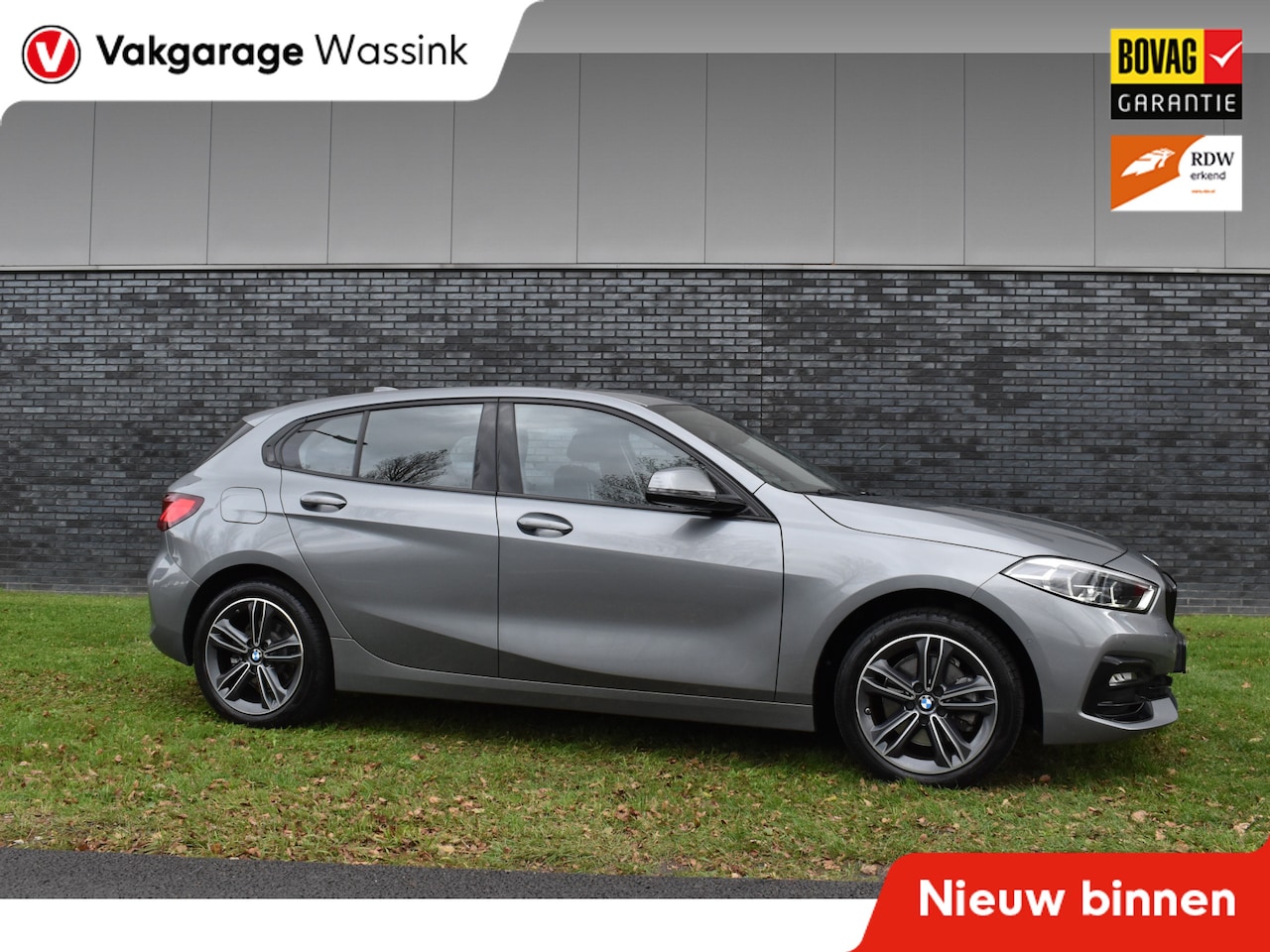 BMW 1-serie - 118i Sport Line 1.5 100kW Automaat/Navigatie/carplay/stoelverwarming/btw auto - AutoWereld.nl