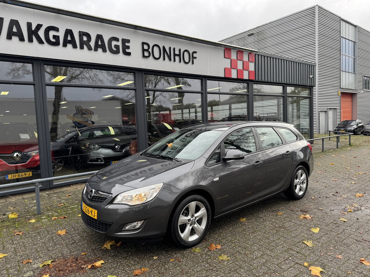 Opel Astra Sports Tourer - 1.4 Edition AIRCO-CRUISE - AutoWereld.nl