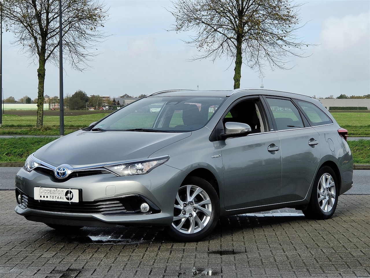 Toyota Auris Touring Sports - 1.8 Hybrid Edition S | Camera | Navi | Lane Assist | Stoelverwarming - AutoWereld.nl