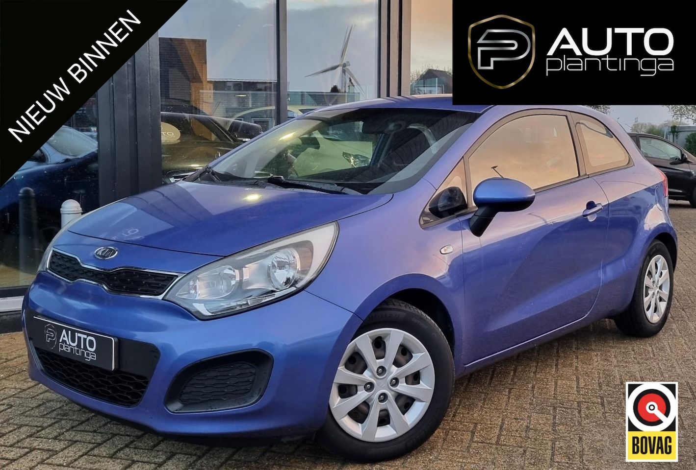 Kia Rio - 1.2 CVVT Comfort Pack 86PK | NL AUTO | Afneembare Trekhaak | Parkeersensoren | Airco | Ond - AutoWereld.nl