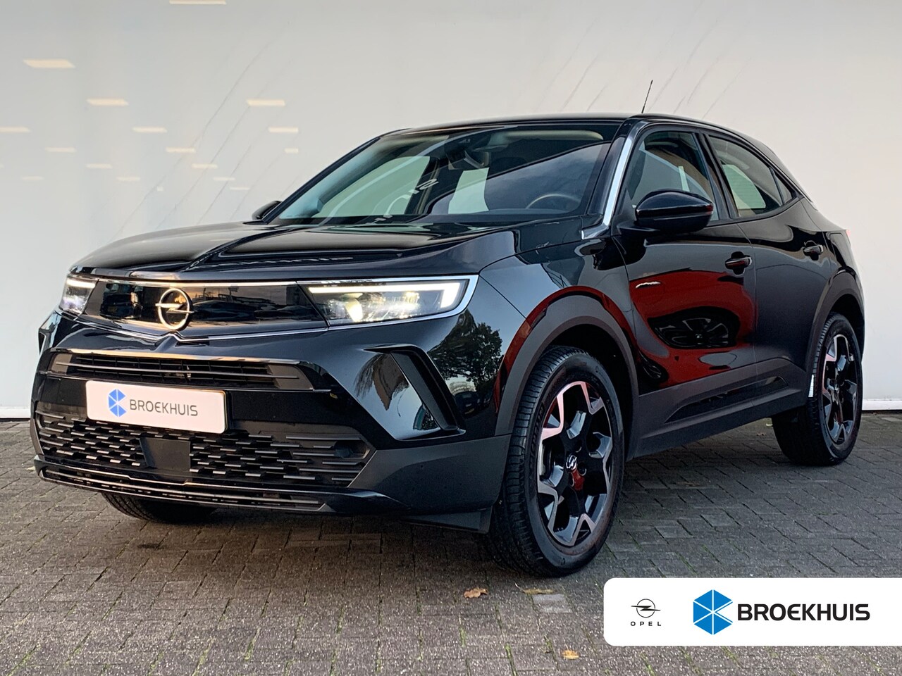 Opel Mokka - 1.2 100pk 6 versnellingen Airco | Cruise | navi by app | Full led | 1ste eigenaar - AutoWereld.nl