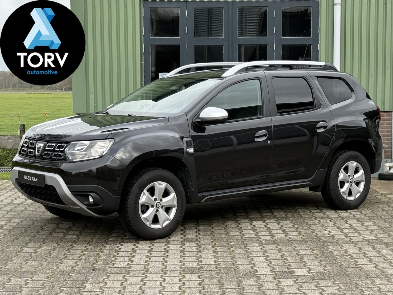 Dacia Duster - 1.2 TCe Comfort | 1e Eigenaar | Trekhaak | Navigatie | Parkeersensoren | Cruise Control | - AutoWereld.nl