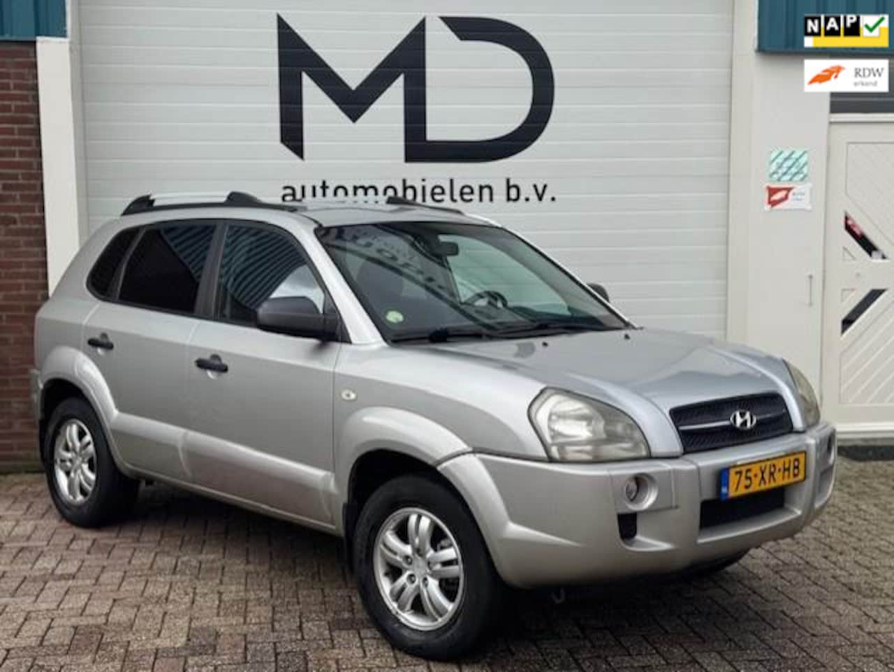 Hyundai Tucson - 2.0i Dynamic Cross-DealerOnderhouden-Trekhaak - AutoWereld.nl