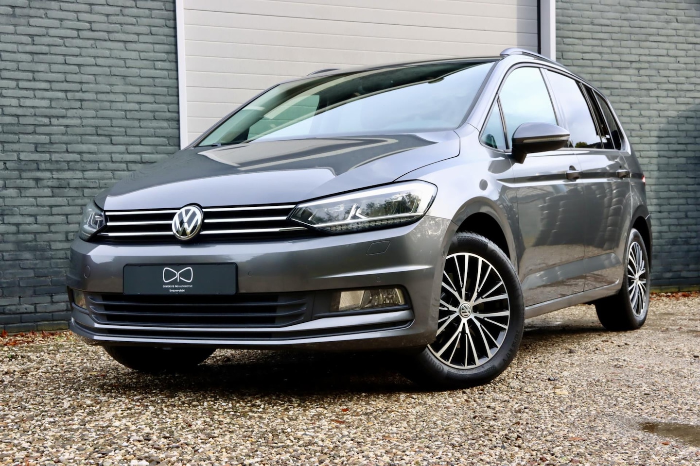 Volkswagen Touran - 1.4 TSI Highline 7p | XENON | NAVIGATIE | CARPLAY | TREKHAAK | STOELVERWARMING - AutoWereld.nl