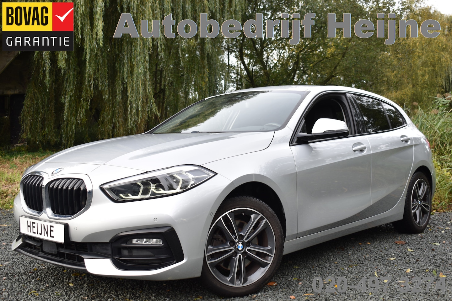 BMW 1-serie - 118IA 140PK HIGH EXECUTIVE CAMERA/NAVI/HALF-LEDER - AutoWereld.nl
