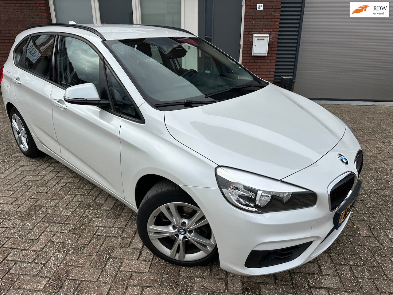 BMW 2-serie Active Tourer - 218i Centennial High Executive / Navi / PDC / LED / AUT - AutoWereld.nl