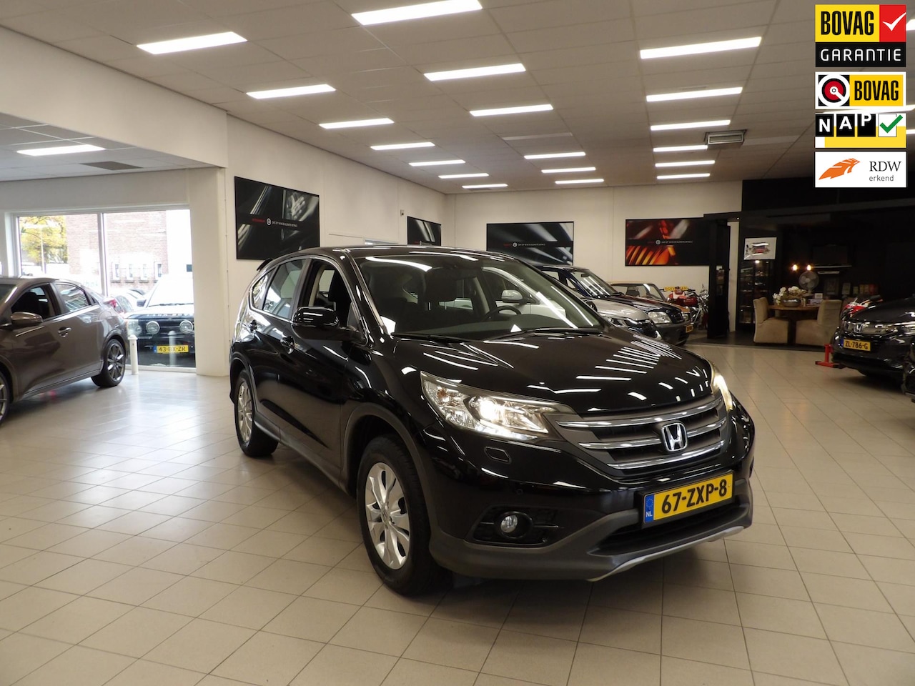 Honda CR-V - 2.0 AWD Elegance CRV 4wd automaat navigatie -parking- XENON/ACHTER SPOILER//12 MAANDEN BOV - AutoWereld.nl