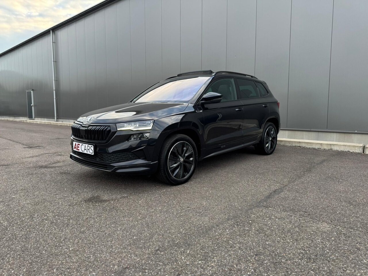 Skoda Karoq - 1.5 TSI ACT Business Edition Plus Monte Carlo Pano Camera Led - AutoWereld.nl