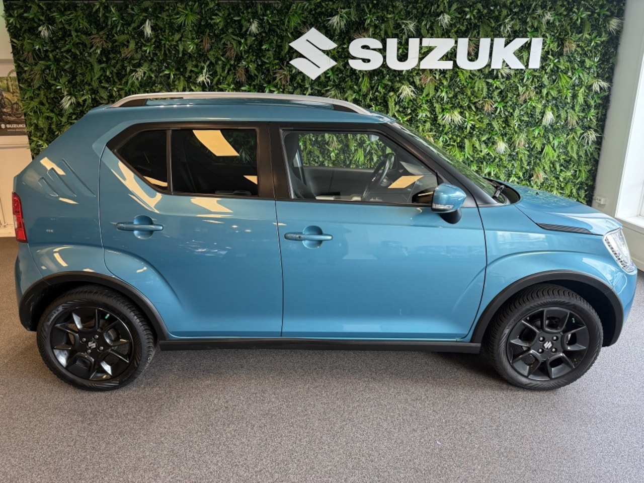 Suzuki Ignis - LMV+All seasons NAVI CC 1.2 Stijl Sm. Hybrid A.uitrijcam Handsfree bellen Stoelverw. - AutoWereld.nl