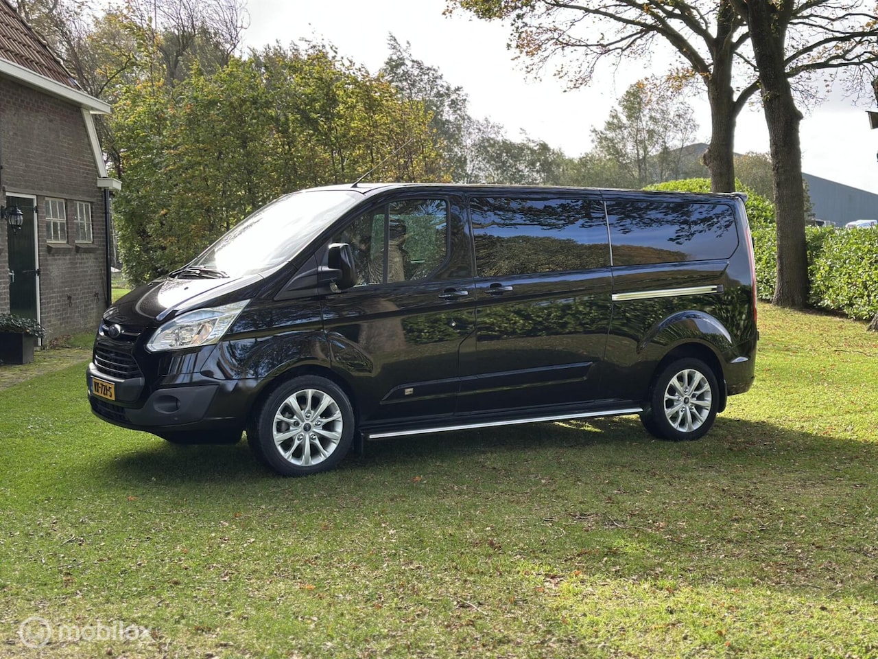 Ford Transit Custom - 2.2 TDCI 155pk L2 Anniversary Edition DC - AutoWereld.nl