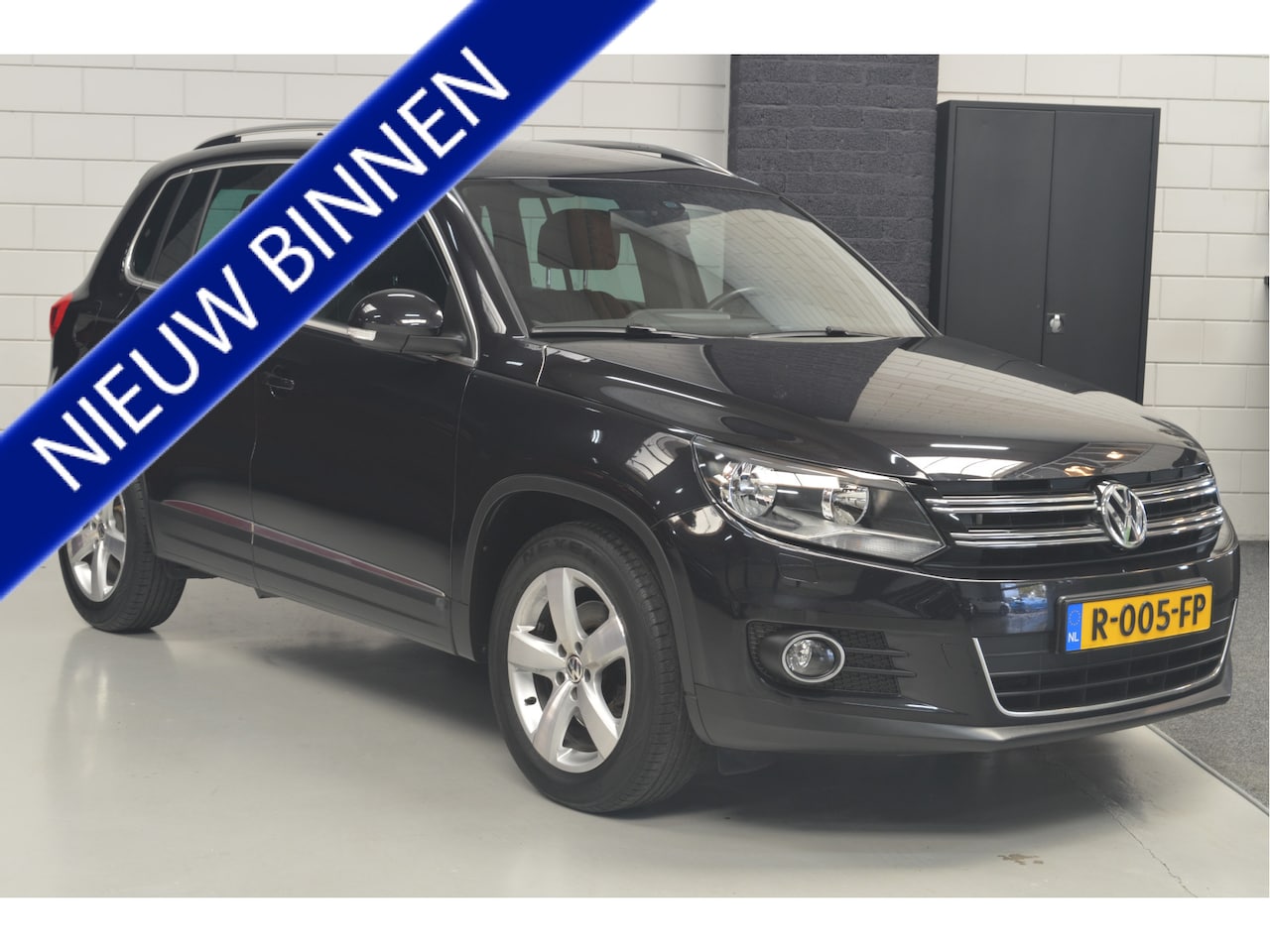 Volkswagen Tiguan - 1.4 TSI Sport&Style // 140.000 km // TREKHAAK // CLIMA // CAMERA // NAVI // PDC // - AutoWereld.nl